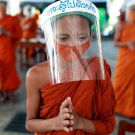 Face Masks and Pali: Life for Buddhist Novices in Thailand Goes On amid Social Distancing