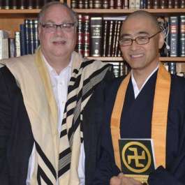 Japanese Monk Seeks to Shift Perceptions of the Buddhist Swastika