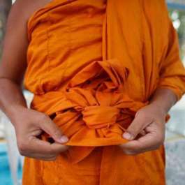 Thai Buddhist Monks Wearing Robes Made from Recycled Plastic Bottles