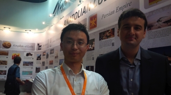 Mudjat Yelbay with Raymond Lam at the Hong Kong Book Fair 2013.