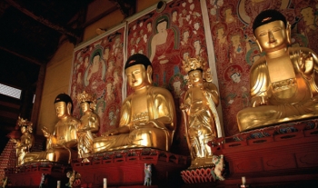 The three Buddhas of Chinese Buddhism. From eng.templestay.com.