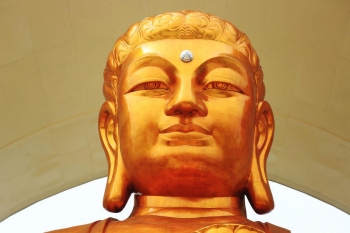 Amitabha Buddha at Donglin Temple. From english.caixin.com.