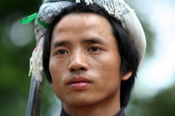 A young man of the Miao ethnic minority. By Cyril Massenet, from Wikimedia Commons.