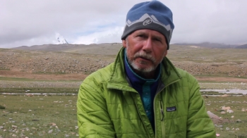 Don Nelson reflects on the meaning of pilgrimage and Mount Kailash. Screenshot from the film.