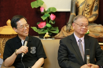 Alan Kwan (left) with Prof. Lee, Chairman of Tung Lin Kok Yuen (right). Alan is the founding editor of Buddhistdoor. From Buddhistdoor.com.