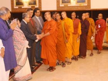 The President of Bangladesh, Abdul Hamid and his wife Rashida Khanom, hosting a reception for members of Buddhist Community at Bangabhaban in 2013. From Xinhua.