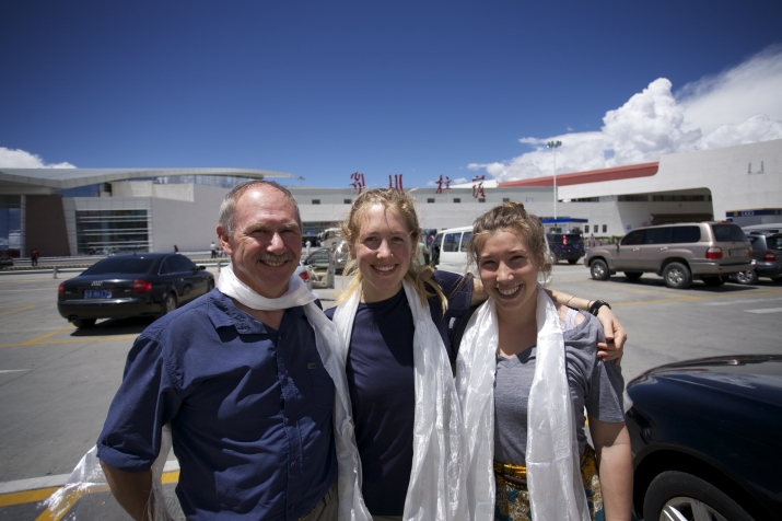 The Nine-Story Mountain filming crew landing in Tibet, on Day 5 of the expedition. From left: Don Nelson, Augusta Thomson, and Lara Yeo.