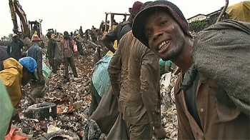 Eric, aka Vocal Slender, is one of the many people who live on the Olusosun rubbish dump in Lagos. From the BBC.