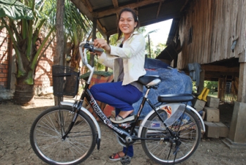 Rina Long from Cambodia received monetary and educational aid from BGR and Lotus Outreach Int. She was in poverty and lacked job skills until the aid allowed her to resume high school. From Lotus Outreach International.