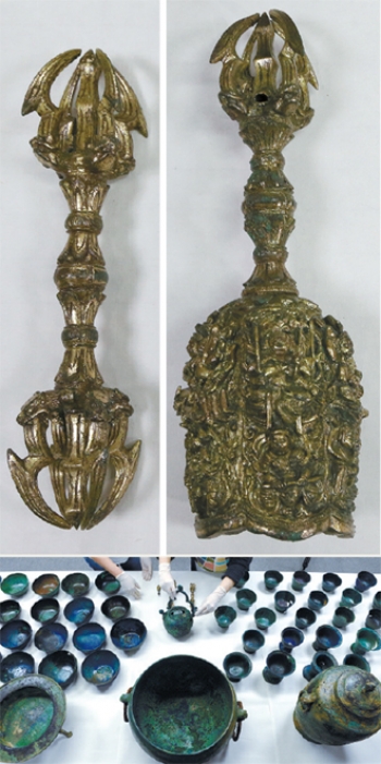 Objects from the cache of Buddhist artifacts discovered at the site of Dobong Seowon. From Newsis.