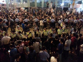 Occupying the main street and stopping buses in Mong Kok, Hong Kong, 29 September 2014. From Breaking News