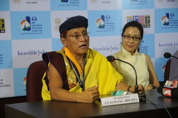 Michelle with HH the Gyalwang Drukpa at the 44th Indian International Film Festival of India in 2013. From Press Information Bureau