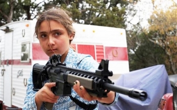 An armed child in the US. From telegraph.co.uk