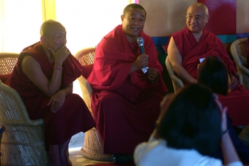 Speaking at the 2009 translation conference, Deer Park Institute, Bir, with Dzongsar Khyentse Rinpoche and Tulku Pema Wangyal Rinpoche. Photograph by Matthieu Ricard. From khyentsefoundation.org
