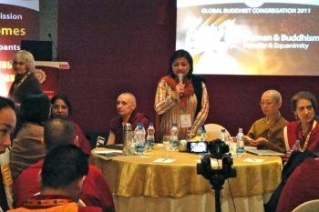Lady Mohini Kent Noon (standing) moderated the panel discussion Women & Buddhism.
