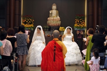The marriage conducted by Ven. Chao-wei, an influential nun, for two lesbians in Taiwan show how far the country's progressed in liberal values.