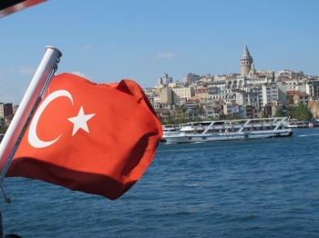 The Turkish national flag flying above a sightseeing deck