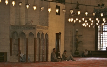 Tranquil moments in the quiet mosque interior