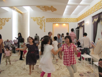 After watching the students perform, everyone joined in the fun of dancing.