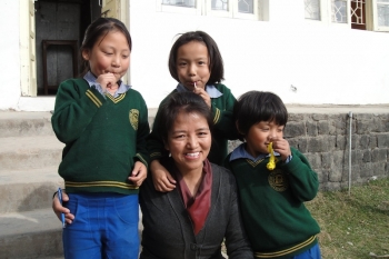 Tibetan Children's Villages (TCV) administrator with some young residents