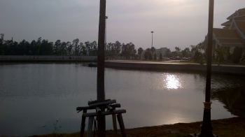 Mahachulalongkorn University's lake by early morning.