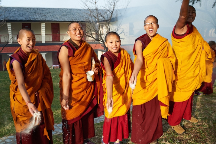 Nuns from Dolma Ling Nunnery on the third day of Losar throwing 