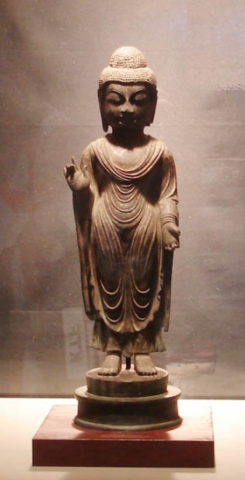 Standing statue of the Tathagata Buddha. From Korea JoongAng Daily