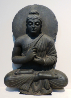 The Buddha teaching, from Loriyan Tangai, Pakistan. Kushan period, c. 2nd century, schist. From Shuyin