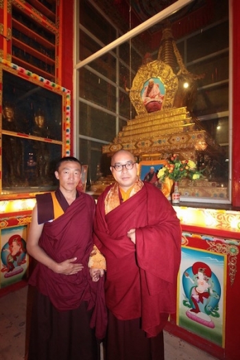 Behind Ngawang Kunga Tenzin Gyatso Rinpoche and Lama Xiang Qiu Hua is Lama Ke Sang’s 
