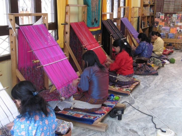 Silk weaving on backstrap looms, Paro, Bhutan. From laurasloom.co.uk