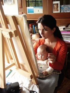 Tiffani working at home with her son in Brazil, 2006