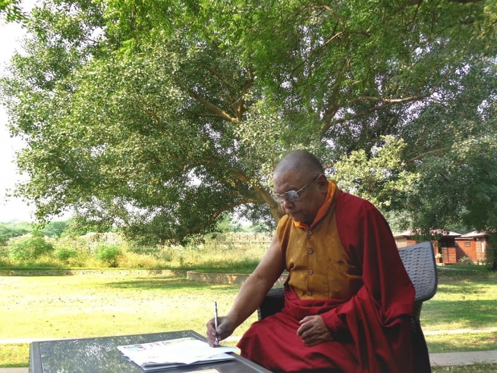 Venerable Lama Lobzang, secretary general of the International Buddhist Confederation (IBC), signing the Buddhist Climate Change Statement to World Leaders, Delhi, India, 28 October 2015. From gbccc.org