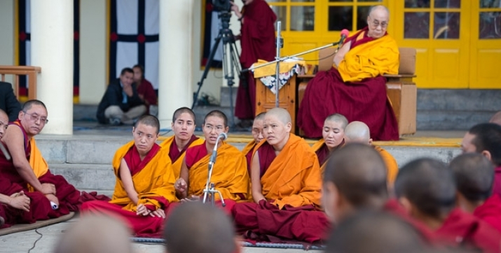 His Holiness the Dalai Lama watches Tibetan Buddhist nuns debate in Dharamsala on Saturday. From tibet.net