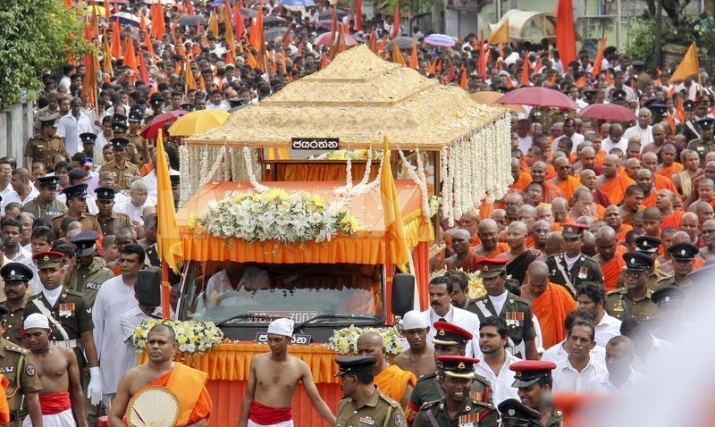 Funeral parade for the late Ven. Maduluwawe Sobitha Thera in Colombo. Photo from demotix.com