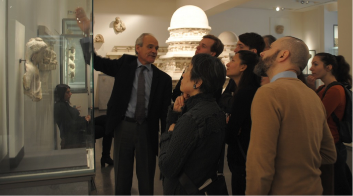 Dr. Pierre Cambon, conservateur en chef at the Musée Guimet, Paris, discussing Gandharan art. From The Courtauld Institute of Art