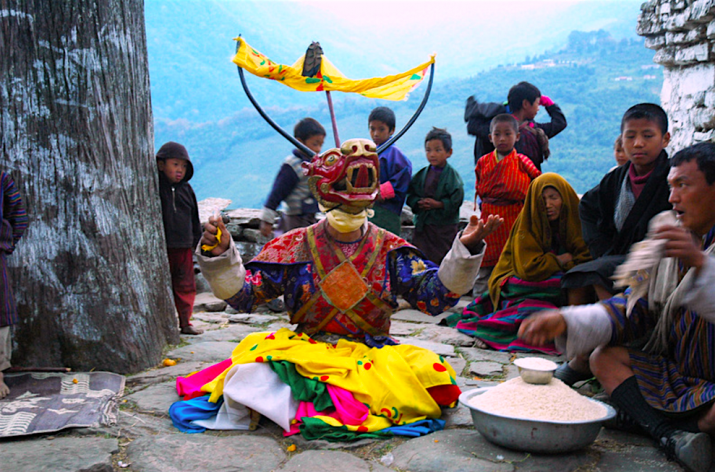 <i>Dharmapala</i> dancer of the Dorje Lingpa lineage making ritual offering in village Cham at Nabji, Bhutan, 2006. From Core of Culture