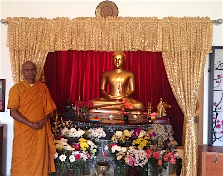 In front of the shrine at Staten Island Buddhist Vihara. Image courtesy of the author