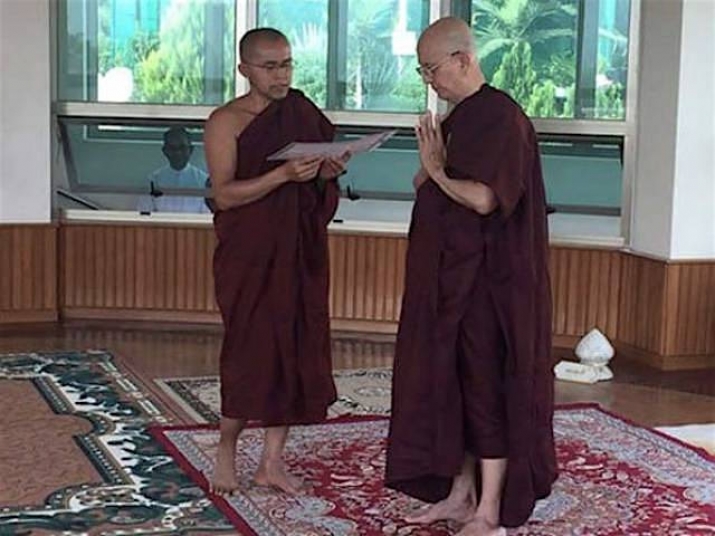 Taking the monastic name U Thandi Dhamma, Thein Sein, right, was ordained on Monday. From tribune.com.pk