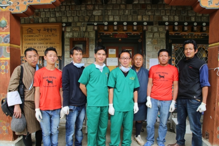 The dog management team in the city of Paro includes two vets (in green scrubs), vet techs, and dog catchers. Photo by Palden Tshewang. From pri.org