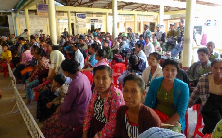 The crowd waits patiently at the charity clinic in Myantaung Monastery