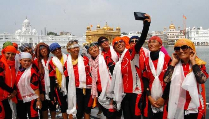 The nuns pose before Golden Temple in Amritsar on Monday. From tribuneindia.com