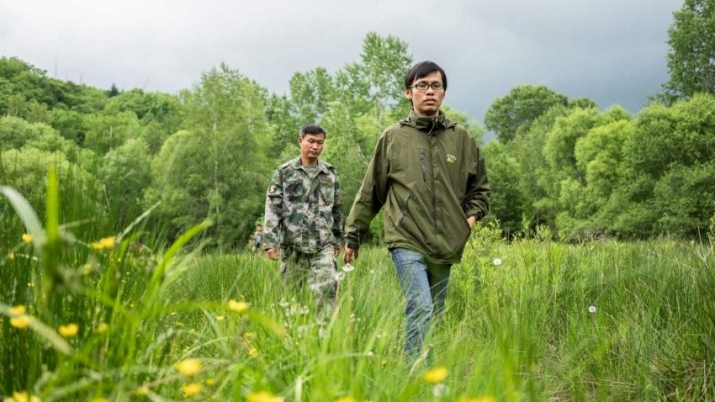 Wildlife biologist Feng Limin, front, has helped to build the case for the new national park. Photo by Yuyang Liu. From sciencemag.org
