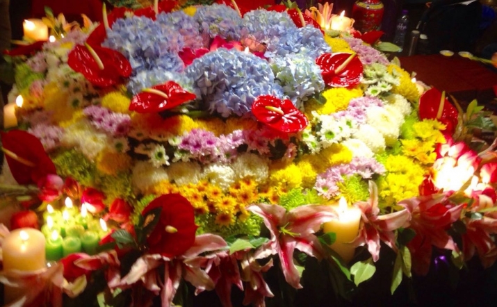 A flower mandala and candlelight ceremony held by Khandro Rinpoche on 25 September. From Jane Miknius