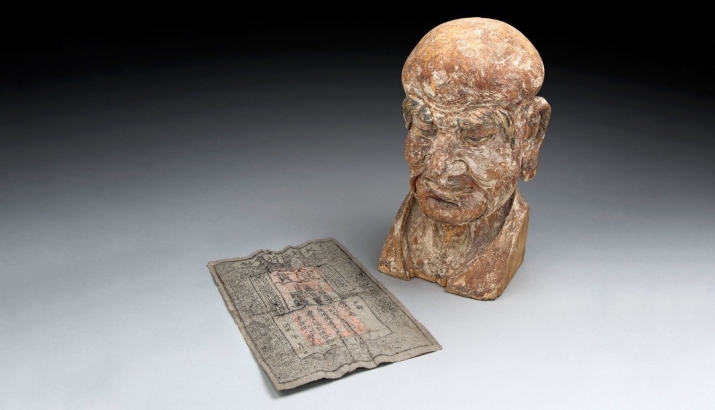 The wooden sculpture and banknote are to be exhibited in Melbourne, London, and Hong Kong. From cnn.com