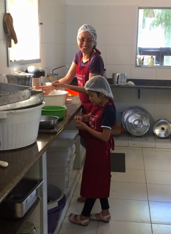 Amaya helping to cook the sangha lunch. From Summer Adams