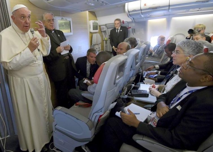 Pope Francis speaks with journalists during a flight to Rome, November 2015. From reuters.com