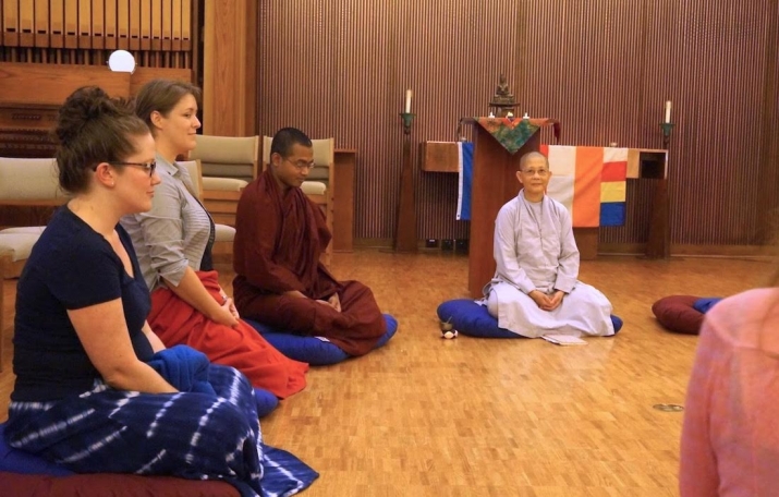 Venerable Thích Nữ Đồng Huệ teaching meditation at Emory University's Buddhist club, seated beside Venerable Upali Sraman