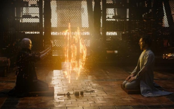 Swinton and Cumberbatch in a still from <i>Doctor Strange</i>. From indiewire.com