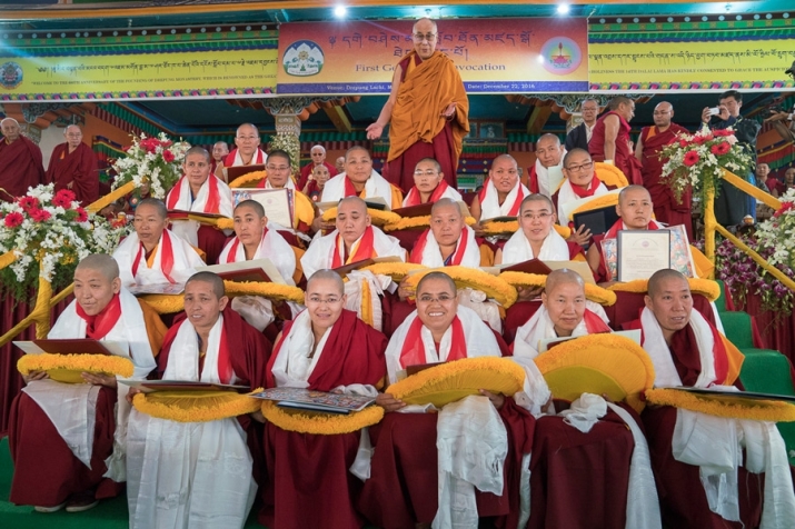 His Holiness poses with the 20 nuns. Photo by Tenzin Choejor. From dalailama.com