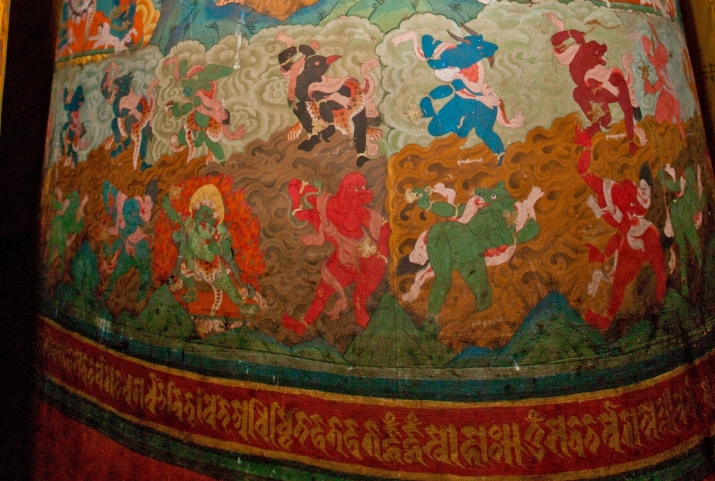 Detail: animal-headed <i>khandum</i> dance two-figures high all around the base of the massive cylinder. The lower row of dancers is about shoulder height to the observer. Walking while viewing causes the paintings to move. Bardo mural, Dungtse Lhakhang, Paro, Bhutan. Photo by Shuzo Uemoto, 2007